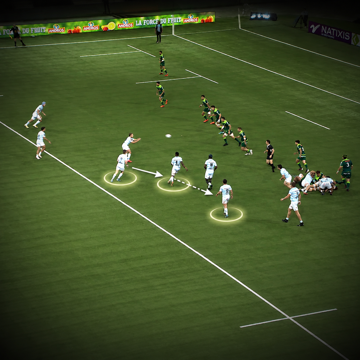 Three rugby forwards rotating from a ruck within an attacking structure