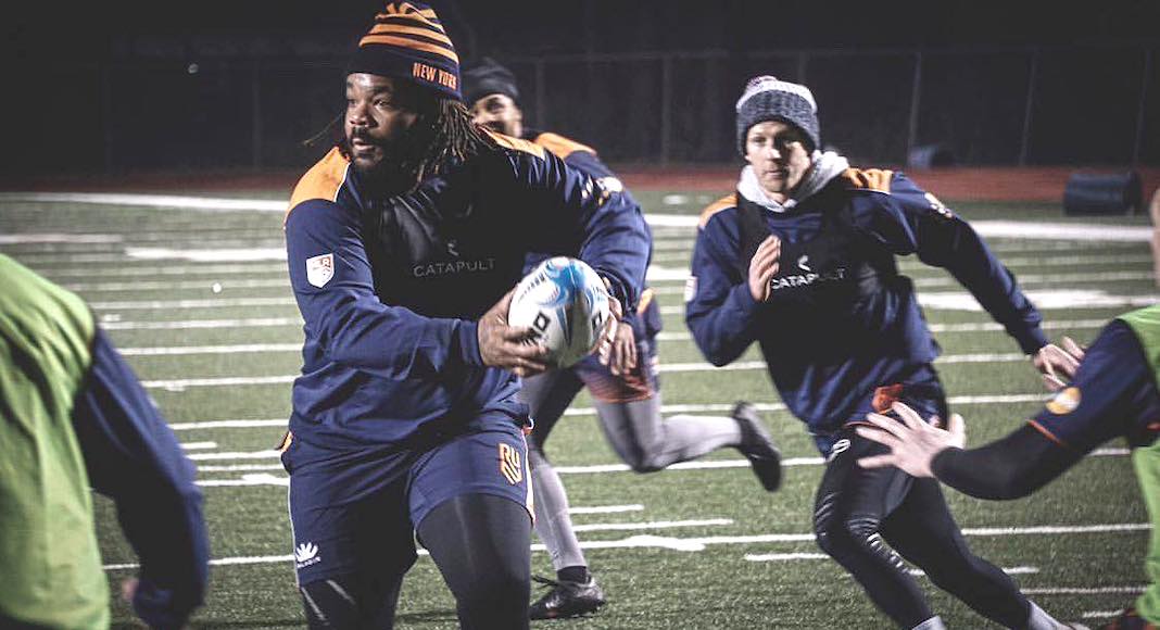 Rugby players taking part in a training session on an artificial field in the United States